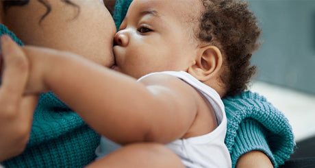 Mother breastfeeding baby